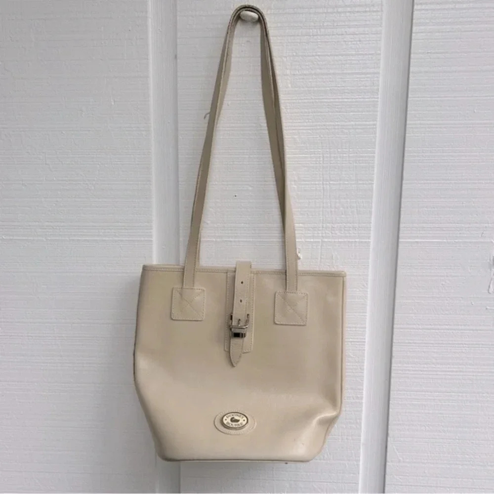 Vintage Dooney & Bourke Cream Leather Buckle Front Detail Bucket‎ Shoulder Bag